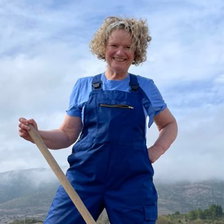 Katie Jones holding a Tuchan rake